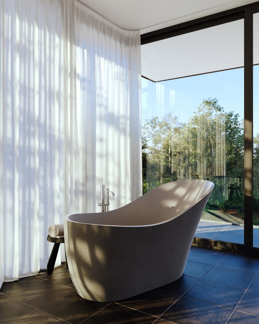 Vast Studio Bathtub Style 2 Slipper tub in Bone Concrete - Lifestyle corner window setting