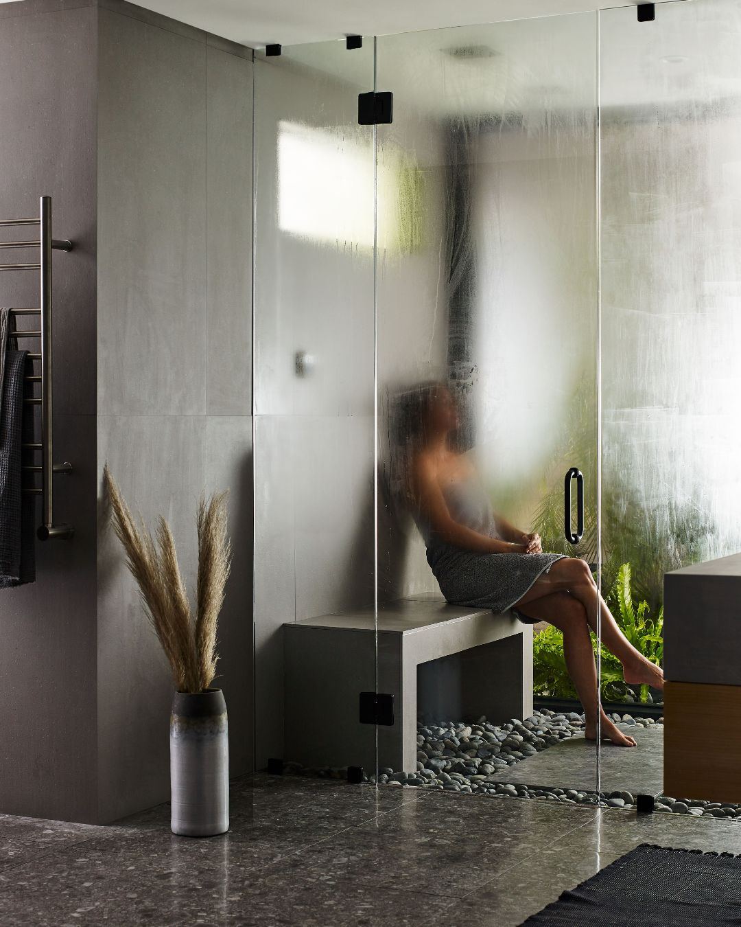 Mr. Steam steam shower environment shows how someone can relax in steam and promote health